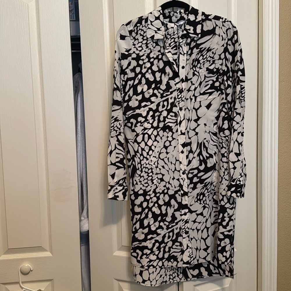 Diane Von Fuerstenberg Prita Shirt Dress in whitew with black abstract print.